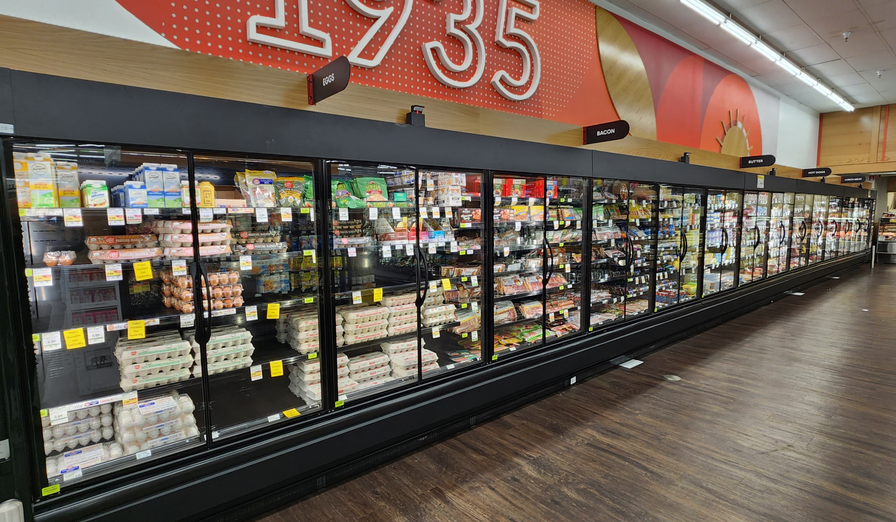 Refrigerated case doors in grocery store.